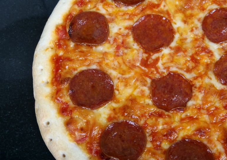 is pepperoni dangerous for dogs